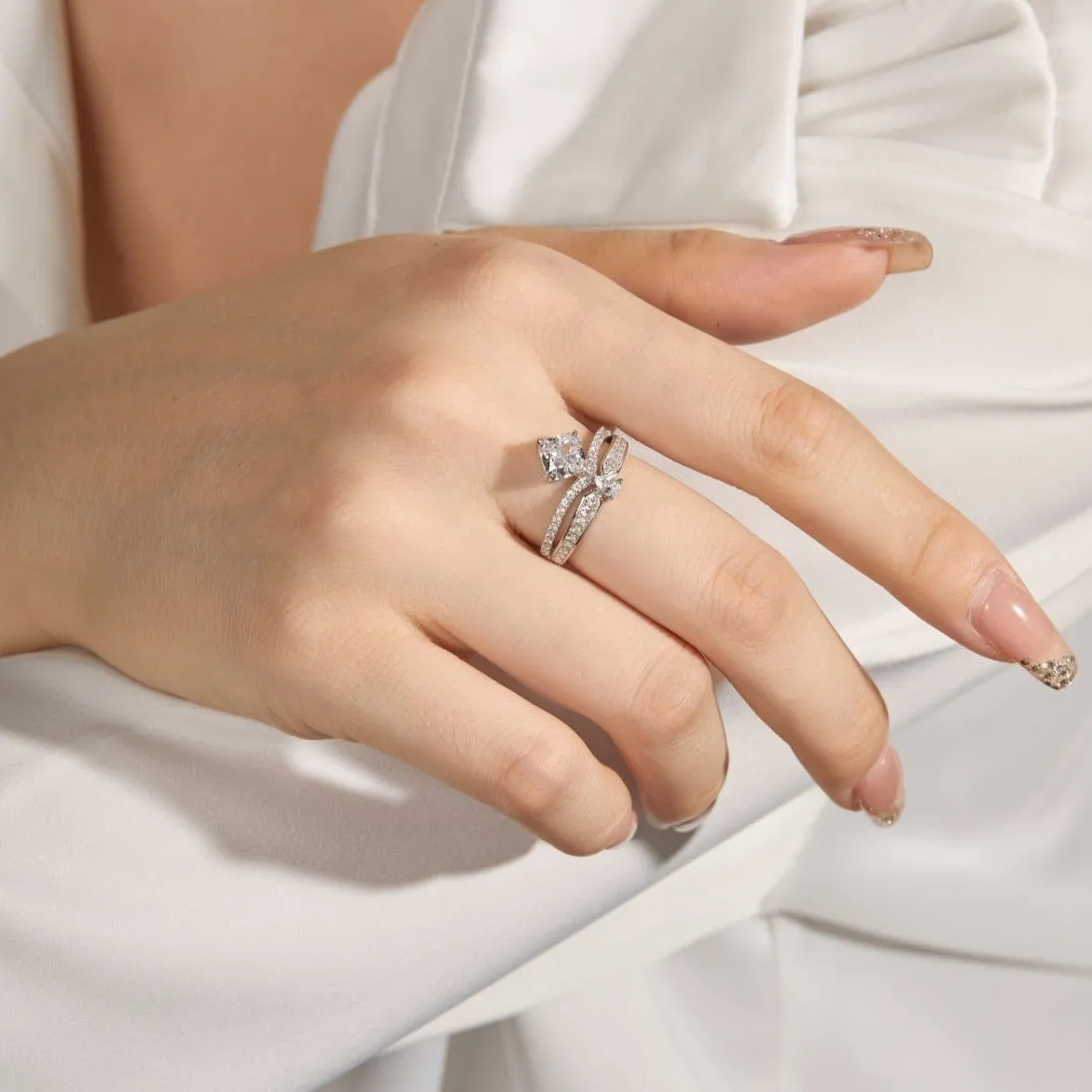 Princess & Pear Cut Curved Split Shank Engagement Ring
